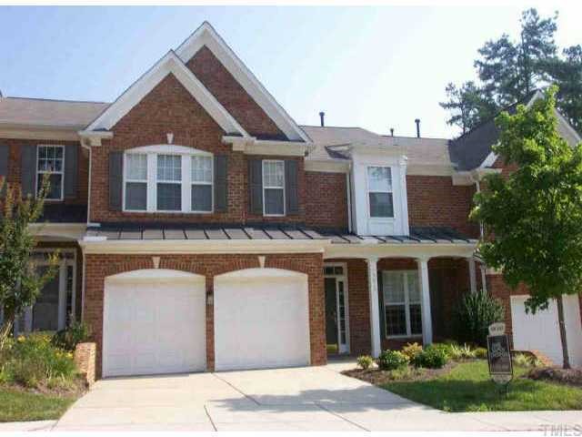 3618 Lion Ridge Court Raleigh, NC 27612 - Photo 1 of 1 a front view of a house with yard