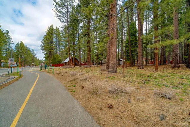 a view of a park with swings and slides
