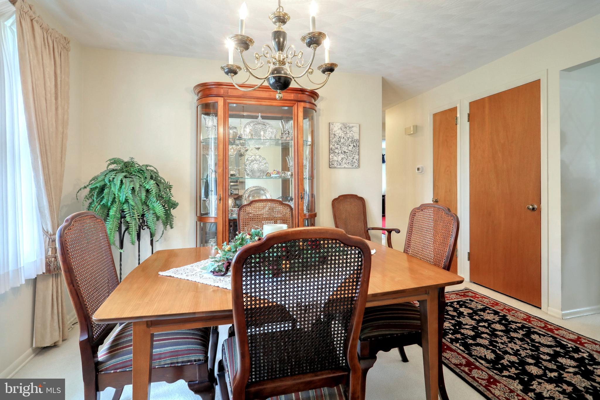 2422 Homedale Road York, PA 17403 - Photo 8 of 37 Dining Room with hardwood under carpet