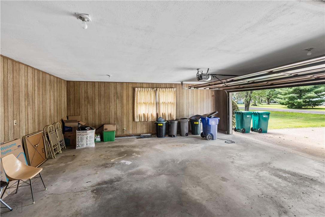 28 Mahnke Road Decatur, IL 62526 - Photo 24 of 27 a view of an empty room with a fireplace and a large window