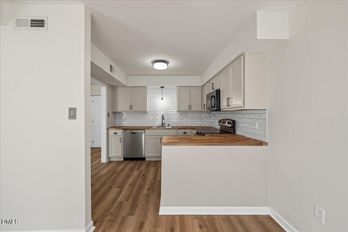 4604 Millstone Drive, Unit D Raleigh, NC 27604 - Photo 3 of 22 13-4604 Millstone Dr unit D