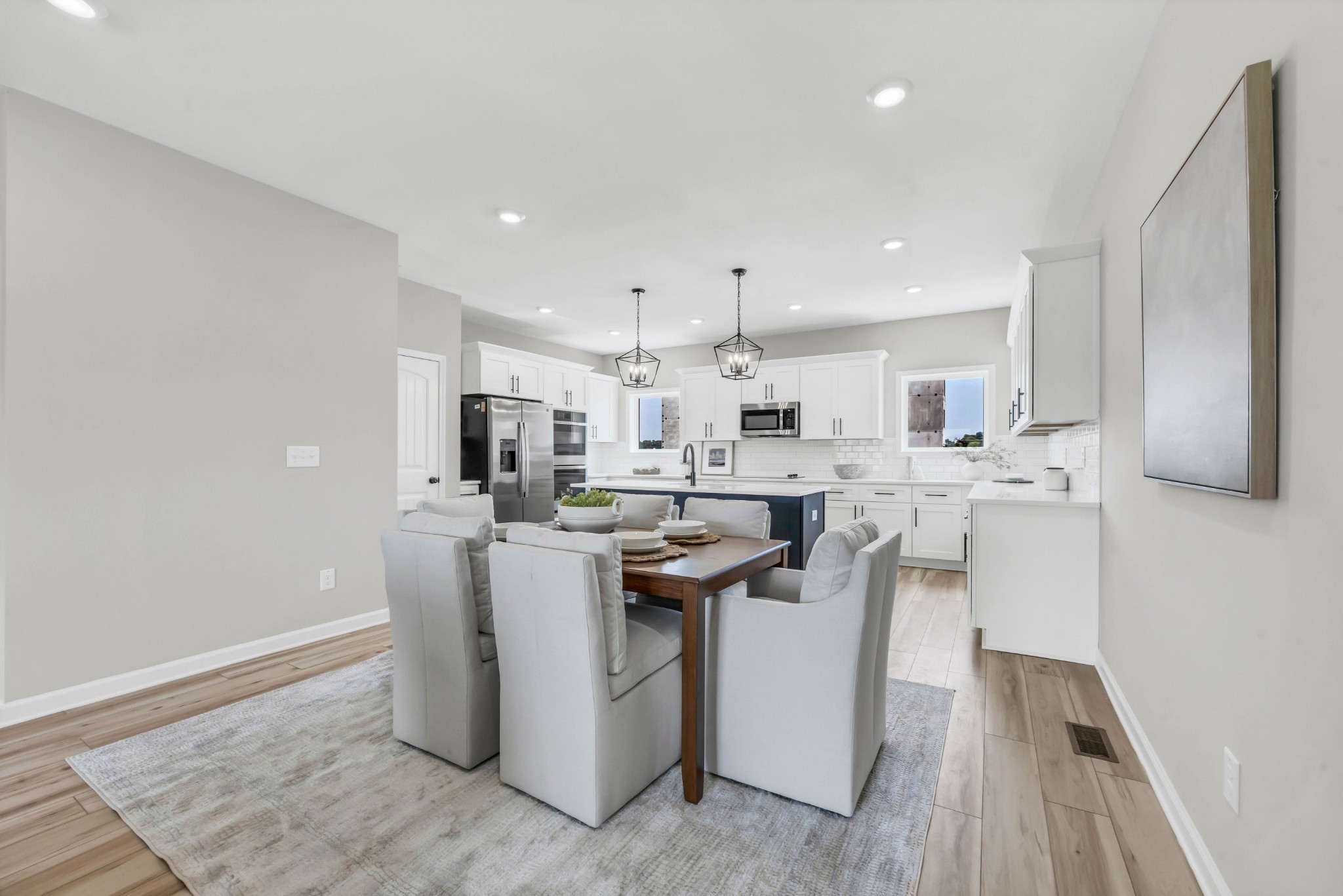 2363 Pea Ridge Road Clarksville, TN 37040 - Photo 15 of 29 a kitchen with stainless steel appliances kitchen island granite countertop a sink and a stove