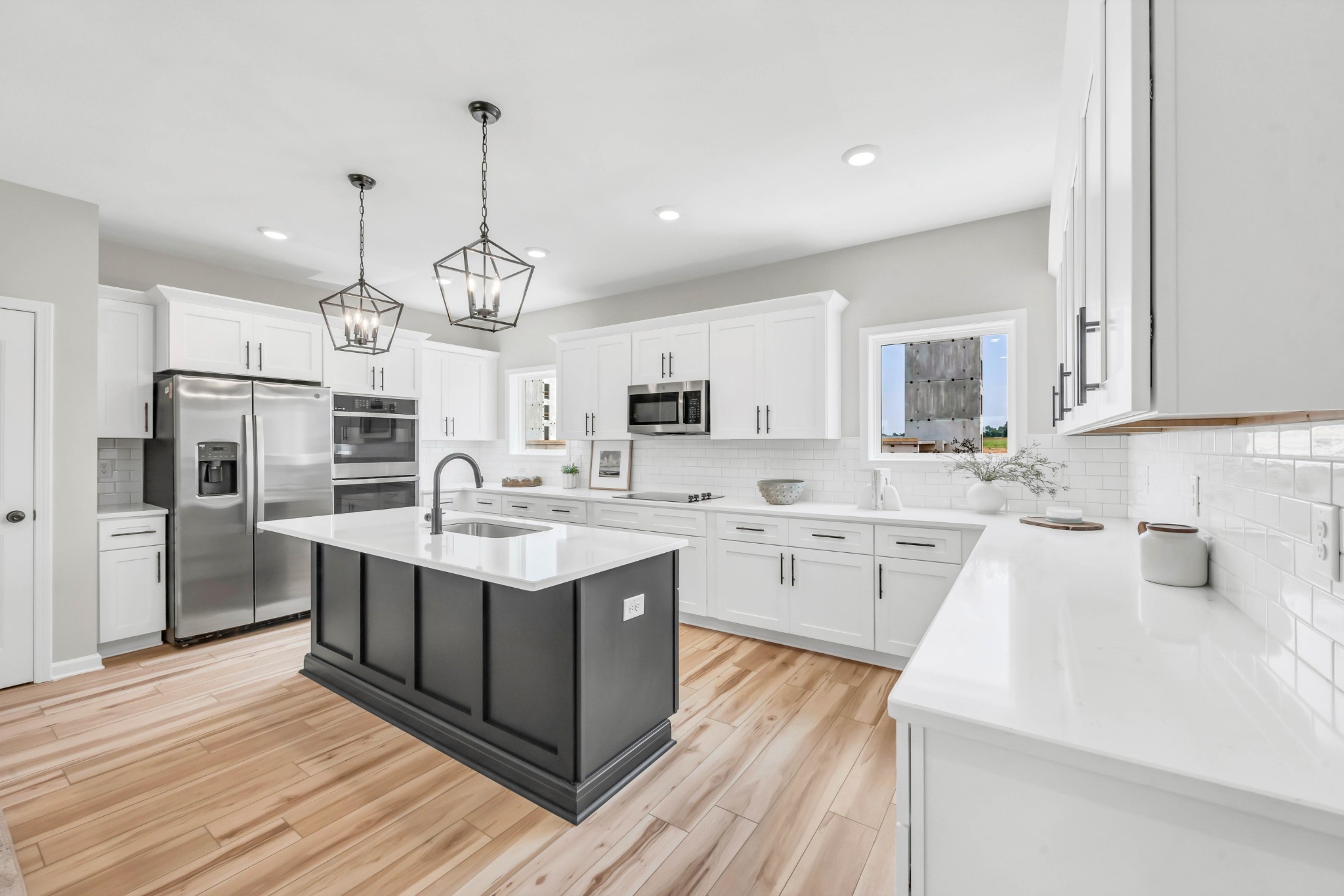 2363 Pea Ridge Road Clarksville, TN 37040 - Photo 18 of 29 a kitchen with stainless steel appliances granite countertop a sink stove and refrigerator