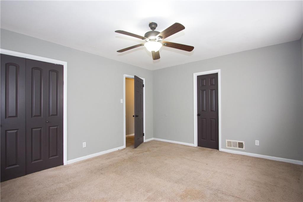 2974 McGlynn Court Decatur, GA 30034 - Photo 16 of 28 a view of an empty room with a ceiling fan