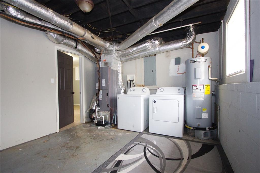 2974 McGlynn Court Decatur, GA 30034 - Photo 22 of 28 a utility room with dryer and washer