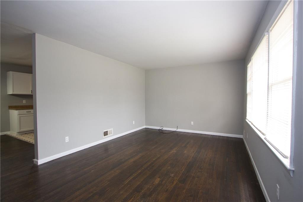 2974 McGlynn Court Decatur, GA 30034 - Photo 3 of 28 wooden floor in an empty room with a window