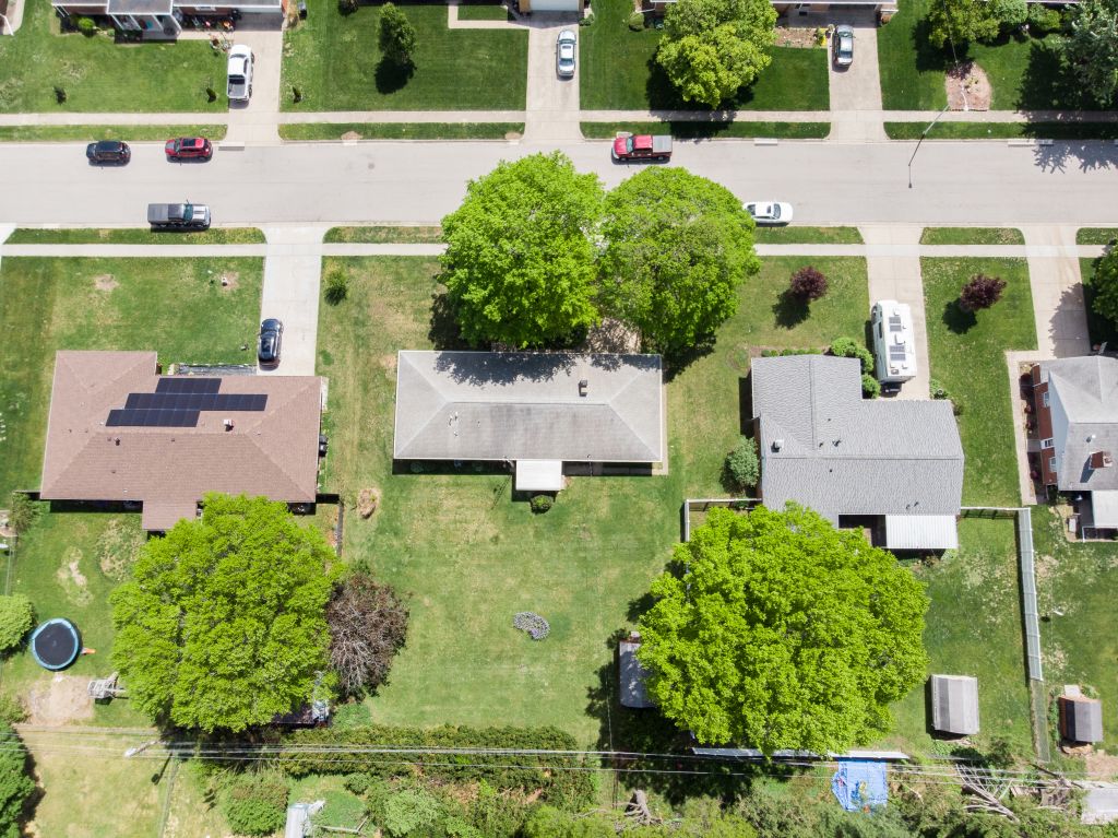 324 Beckenham Road Englewood, OH 45322 - Photo 26 of 26 An aerial view captures the suburban neighborhood with residential properties and lush green landscaping.