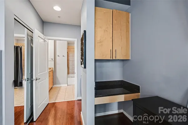 a hallway with wooden floor