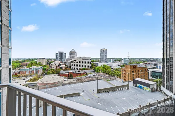 a view of a balcony with city view