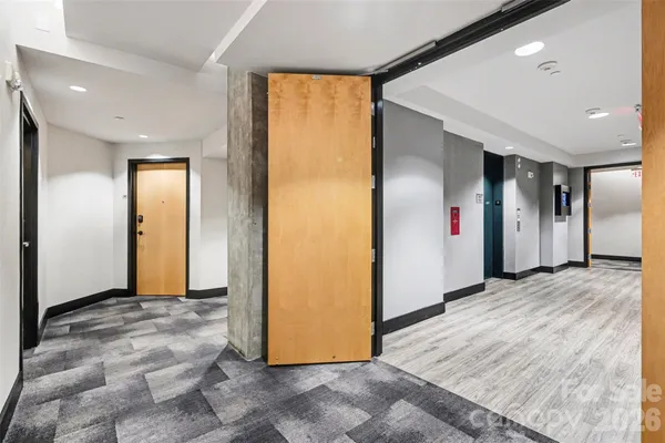 a view of entryway with wooden floor