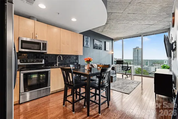 a group of chairs sitting in kitchen and dining room