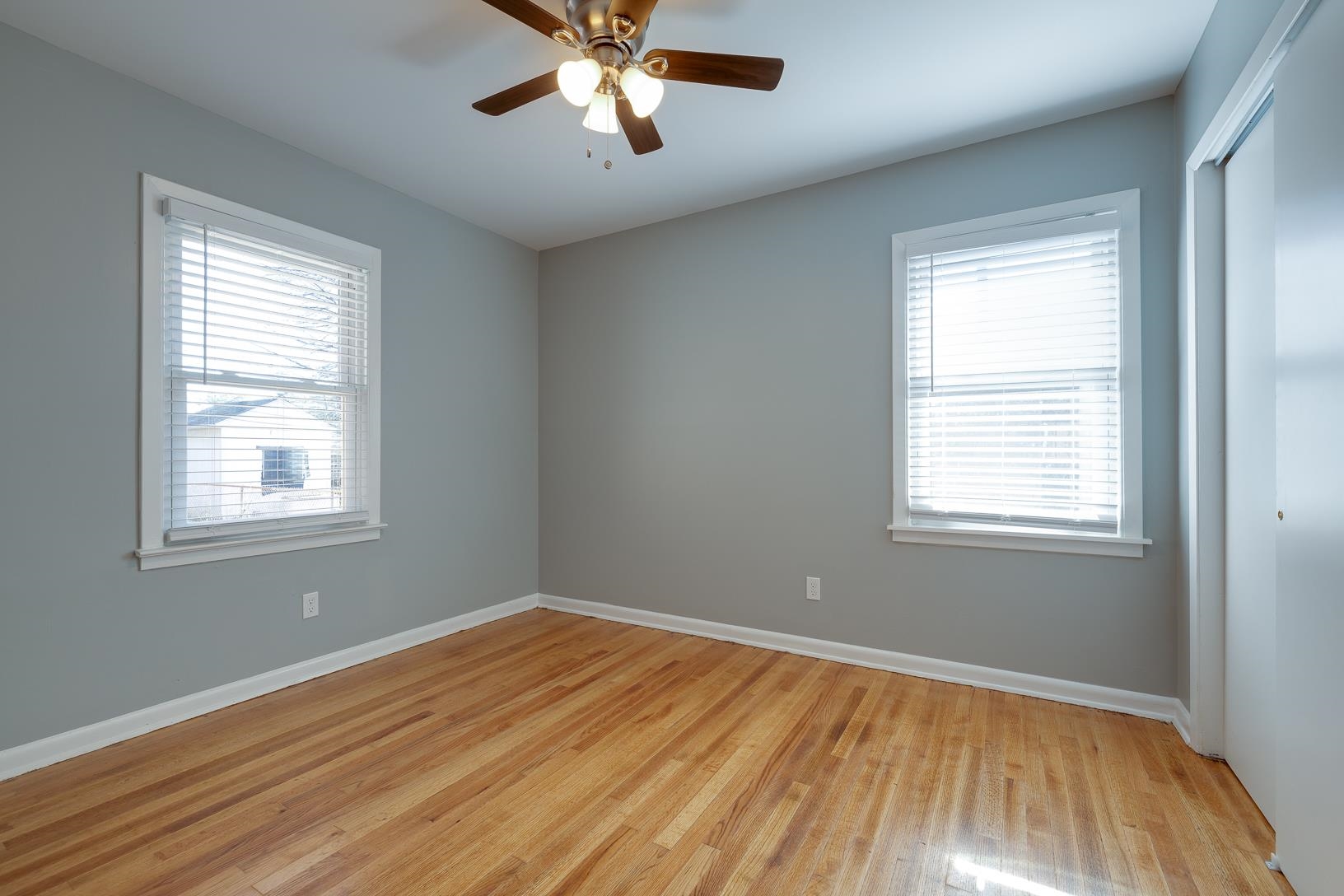 1490 Wilbec Road Memphis, TN 38117 - Photo 17 of 19 a view of empty room with wooden floor and fan