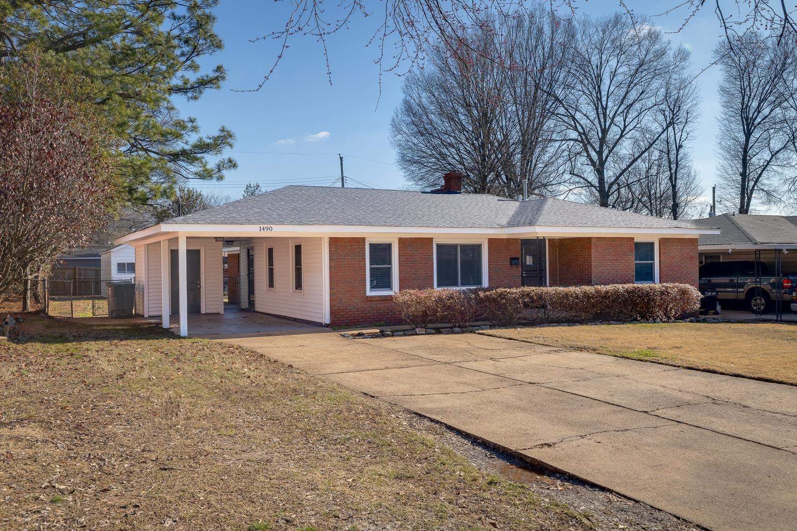 1490 Wilbec Road Memphis, TN 38117 - Photo 2 of 19 a front view of a house with a yard