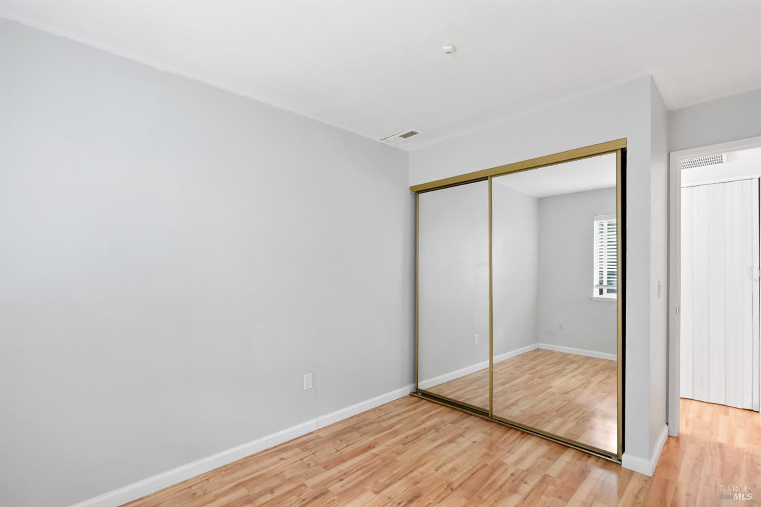 7651 Camino Colegio Rohnert Park, CA 94928 - Photo 12 of 15 a view of a room with wooden floor