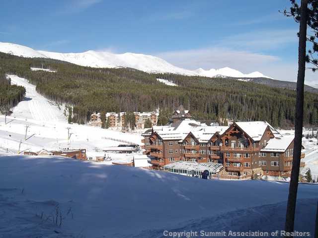407 4 O'Clock Run Road Breckenridge, CO 80424 - Photo 15 of 25 a view of a lake with houses