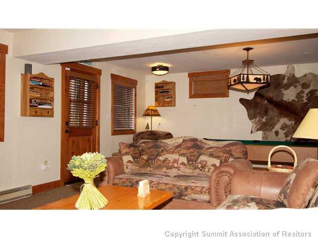 407 4 O'Clock Run Road Breckenridge, CO 80424 - Photo 9 of 25 a picture of a living room with furniture