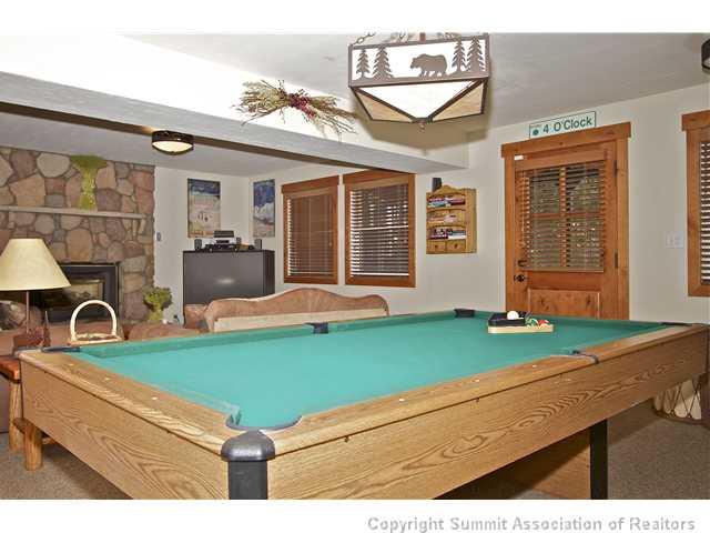 407 4 O'Clock Run Road Breckenridge, CO 80424 - Photo 10 of 25 a room with pool table and chairs