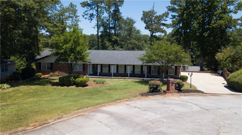 2370 Crestknoll Circle Decatur, GA 30032 - Photo 1 of 1 a view of a house with backyard and sitting area