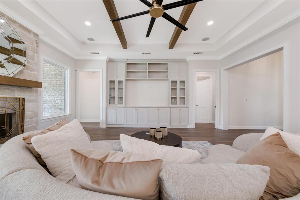 8005 Bee Cave Road China Spring, TX 76633 - Photo 13 of 40 a living room with furniture and a fireplace