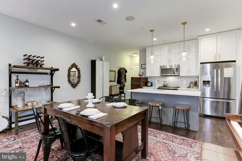 a view of a dining room with furniture