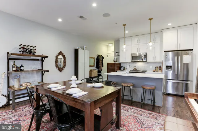 a view of a dining room with furniture