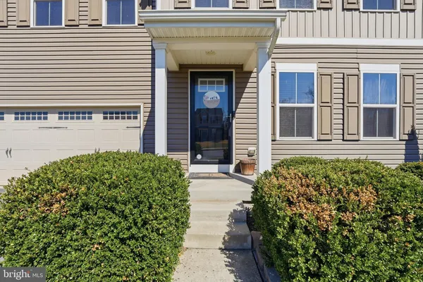 a house view with a garden space