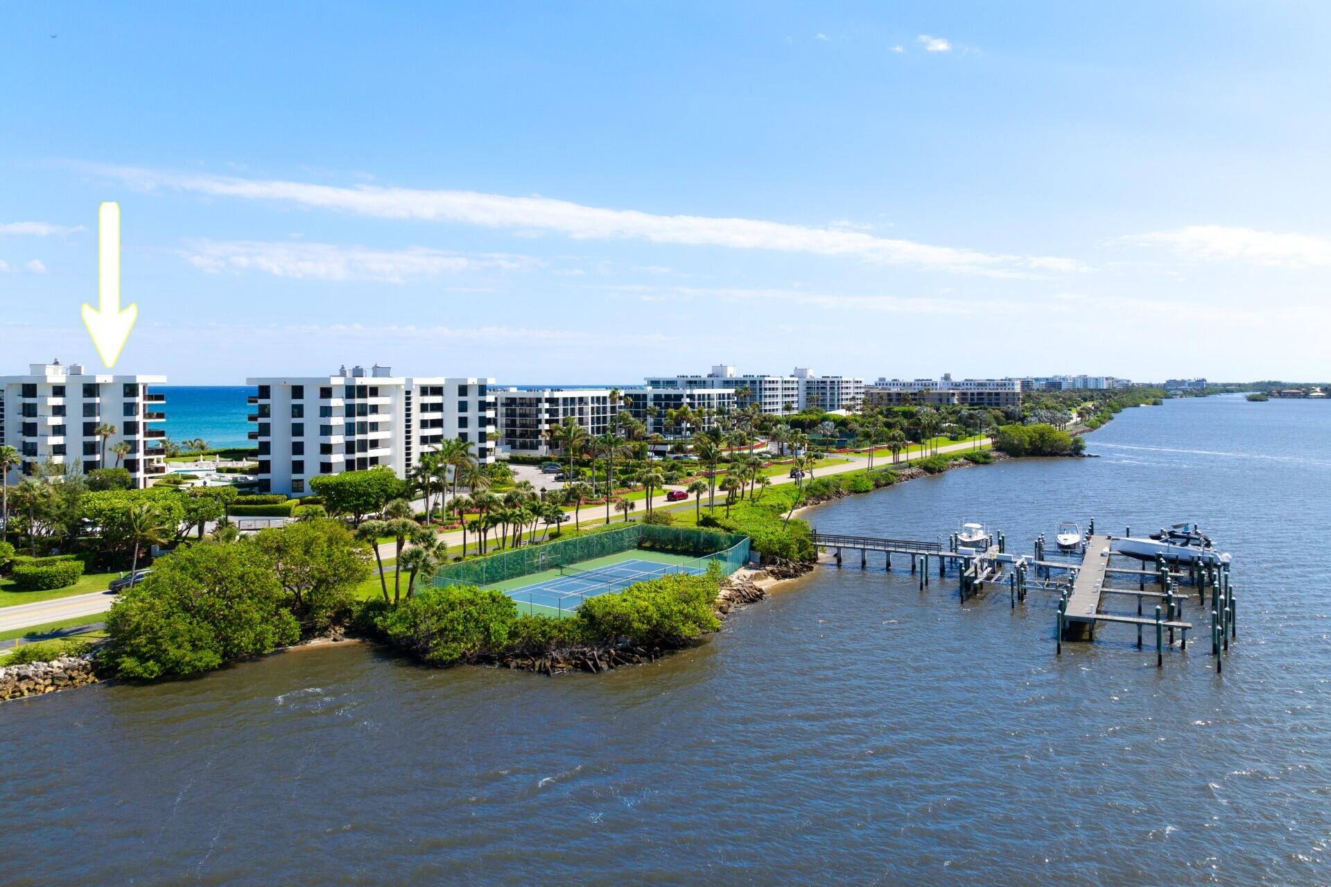 3120 South Ocean Boulevard, Unit 3602 Palm Beach, FL 33480 - Photo 17 of 22 a view of a lake with a table and chairs