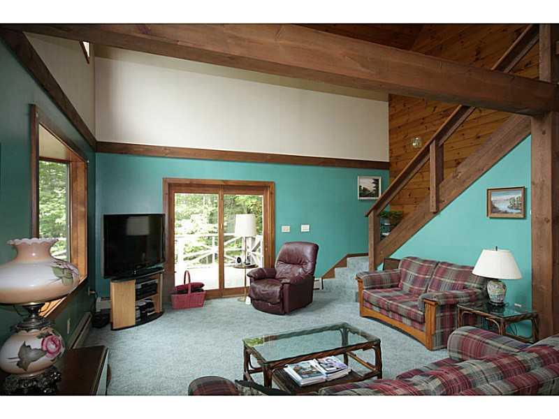 766 Ocean Point Road East Boothbay, ME 04544 - Photo 3 of 24 Living Room. Cathedral ceilings in...