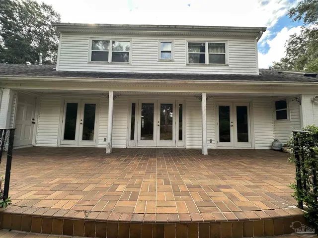 a view of a house with a patio