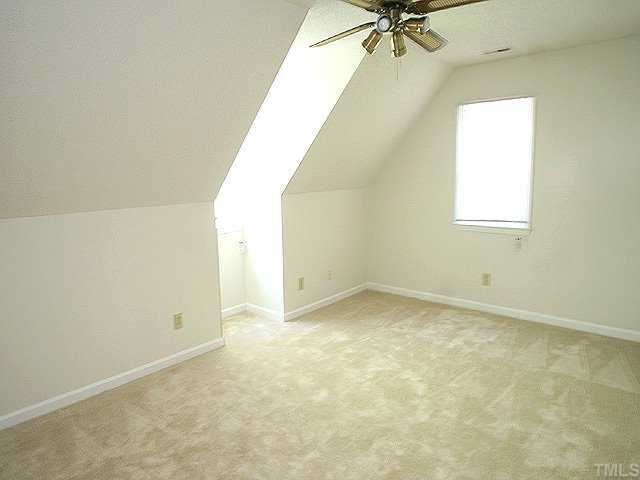 158 Lin Tilley Road Durham, NC 27712 - Photo 8 of 12 an empty room with a window