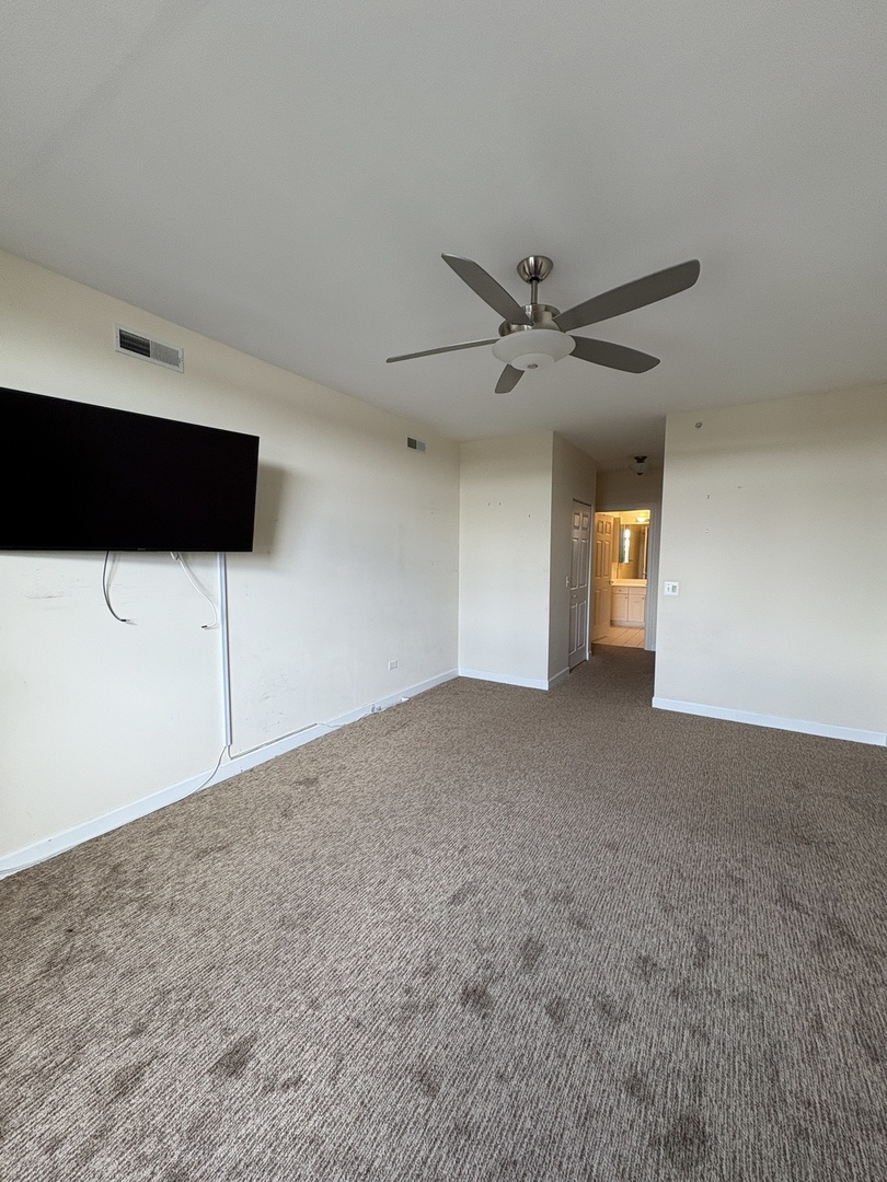 8300 Callie Avenue, Unit 610 Morton Grove, IL 60053 - Photo 15 of 32 a view of an empty room