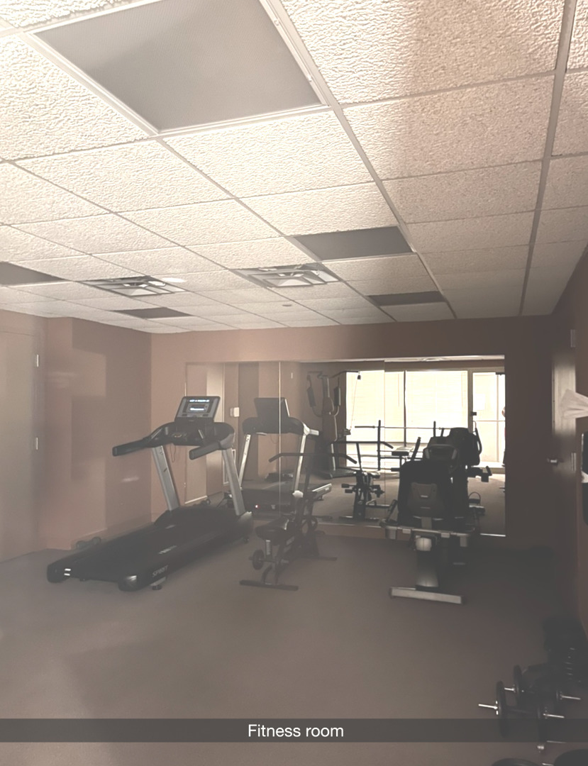 8300 Callie Avenue, Unit 610 Morton Grove, IL 60053 - Photo 26 of 32 a view of a room with gym equipment