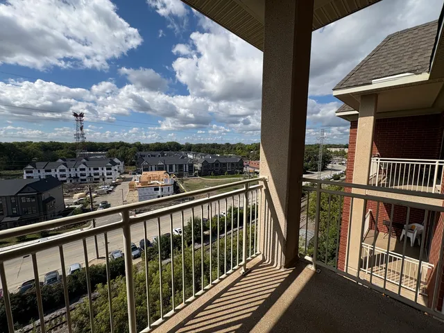 a view of city from a balcony