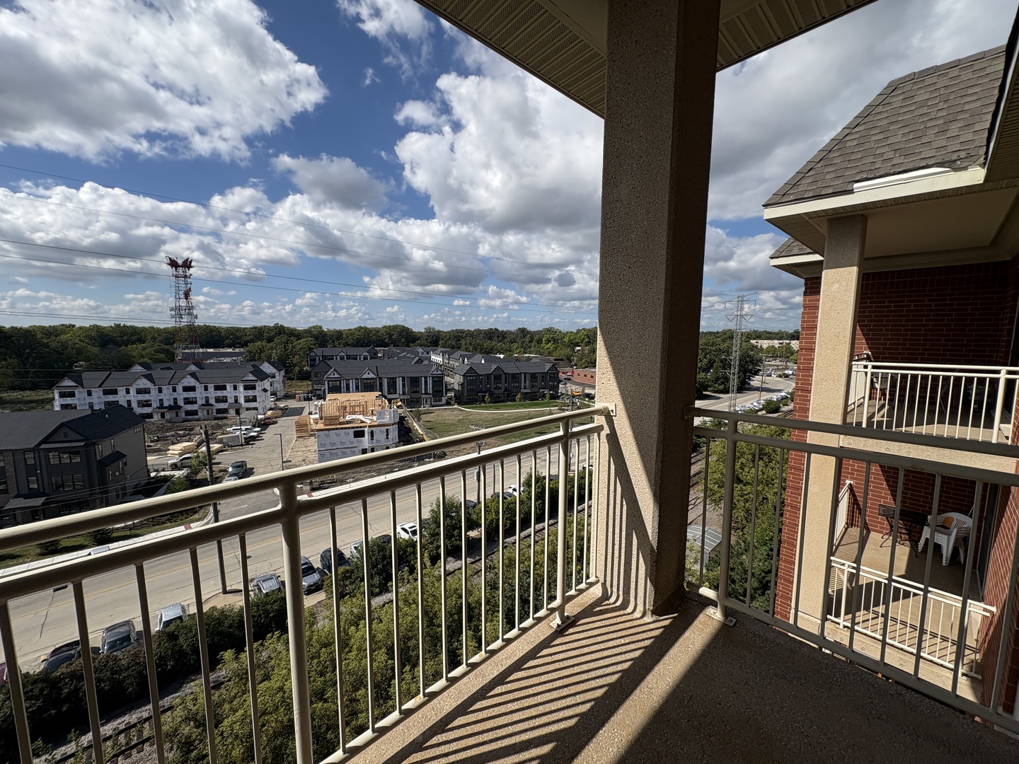 8300 Callie Avenue, Unit 610 Morton Grove, IL 60053 - Photo 27 of 32 a view of city from a balcony