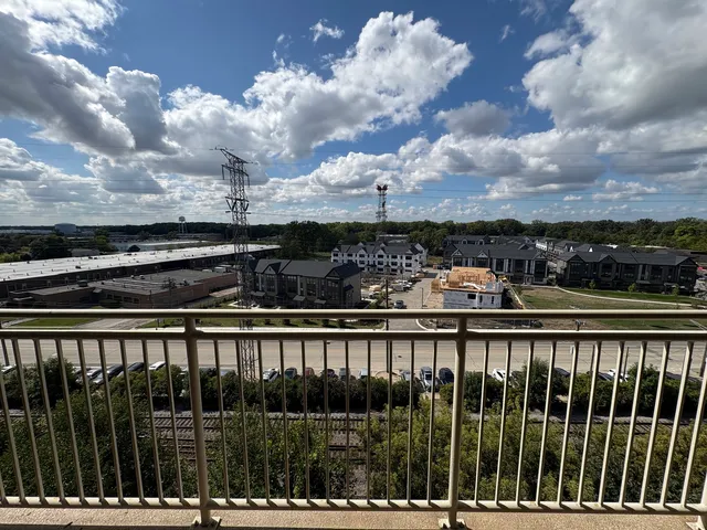 a view of a lake from a balcony