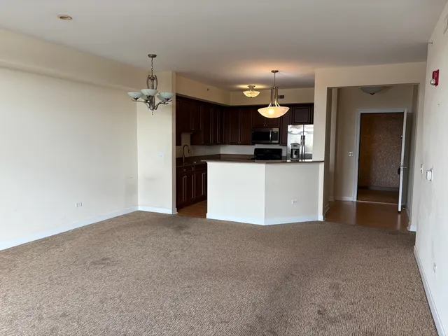 a view of a kitchen with a sink