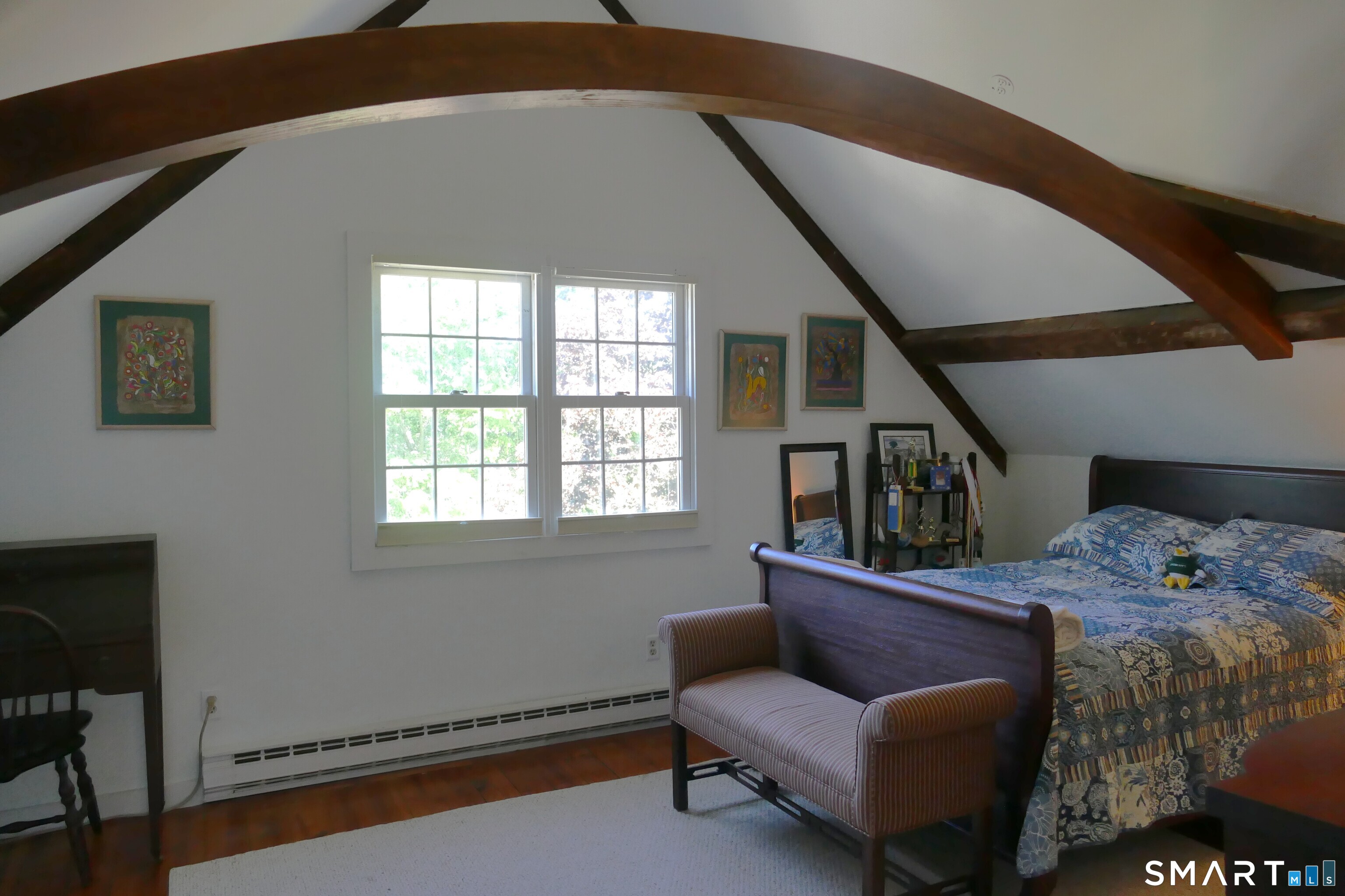 147 Boston Street Guilford, CT 06437 - Photo 24 of 38 a living room with furniture and a window