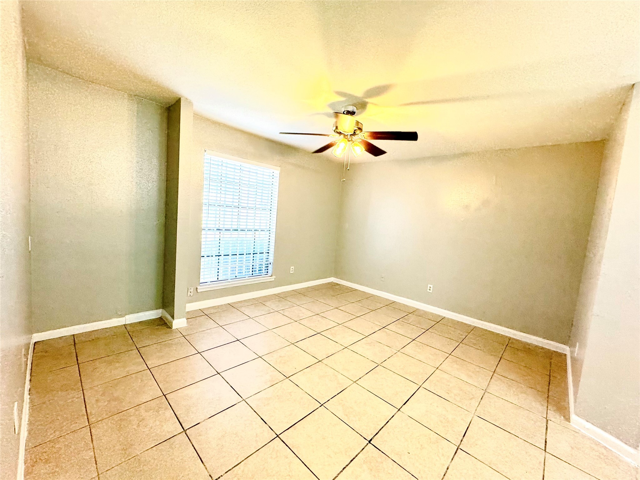 9090 South Braeswood Boulevard, Unit 47 Houston, TX 77074 - Photo 16 of 30 a view of a room with a window