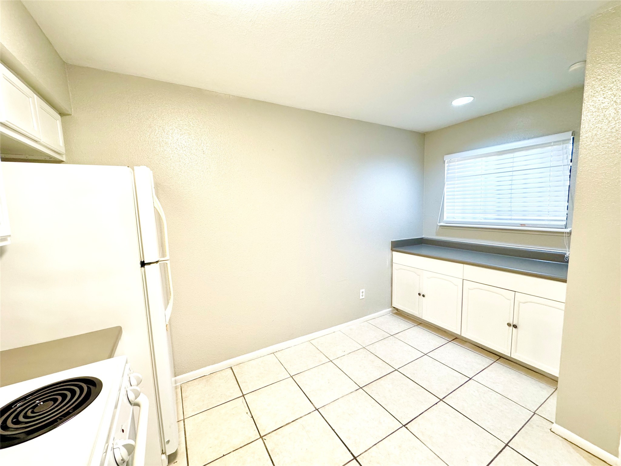 9090 South Braeswood Boulevard, Unit 47 Houston, TX 77074 - Photo 25 of 30 a view of utility room