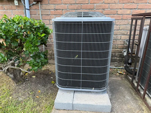 a view of a door with a door and wooden bench