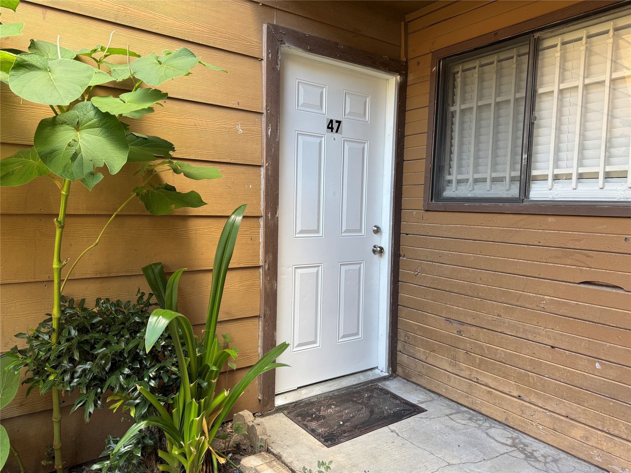 9090 South Braeswood Boulevard, Unit 47 Houston, TX 77074 - Photo 29 of 30 a view of front door