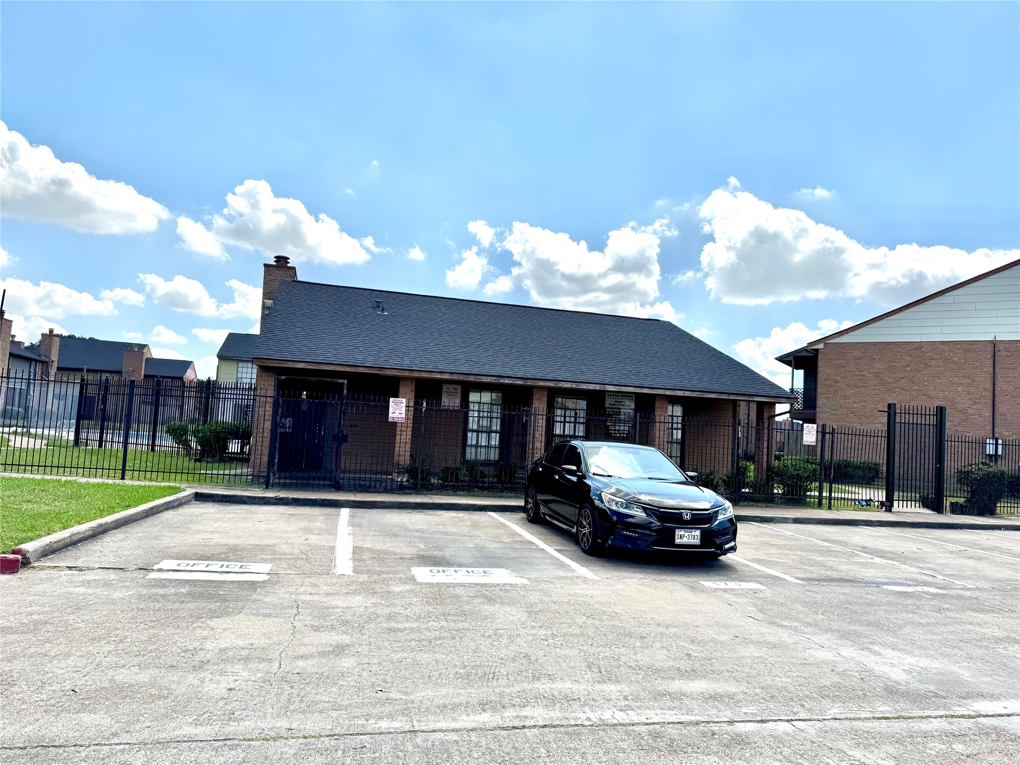 9090 South Braeswood Boulevard, Unit 47 Houston, TX 77074 - Photo 30 of 30 a car parked in front of a building