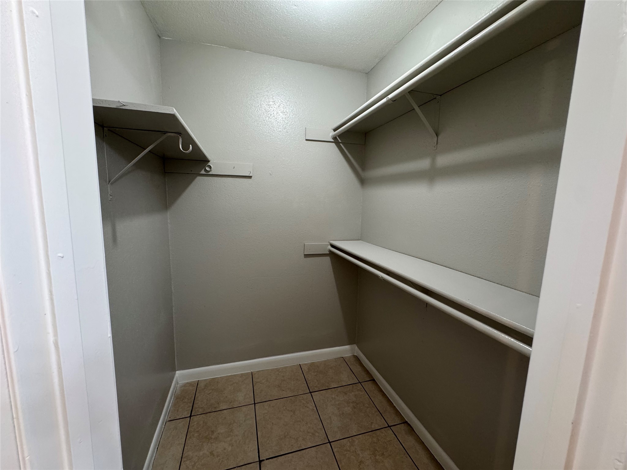 9090 South Braeswood Boulevard, Unit 47 Houston, TX 77074 - Photo 10 of 30 a view of closet