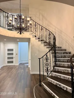 a bathroom with a sink a mirror and vanity