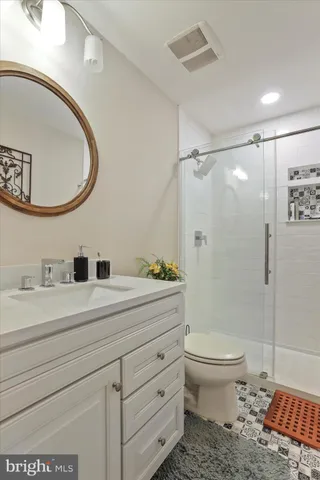 a bathroom with a toilet a sink and a bathtub