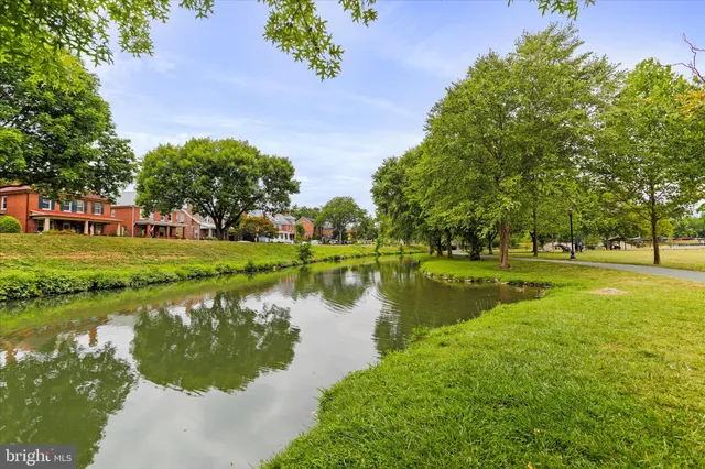 a view of swimming pool with a yard