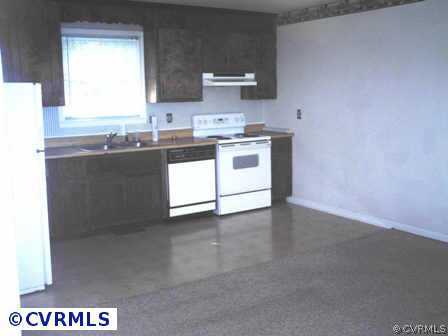 1704 Enon Church Road Chester, VA 23836 - Photo 4 of 4 a kitchen with granite countertop a stove a sink and a microwave