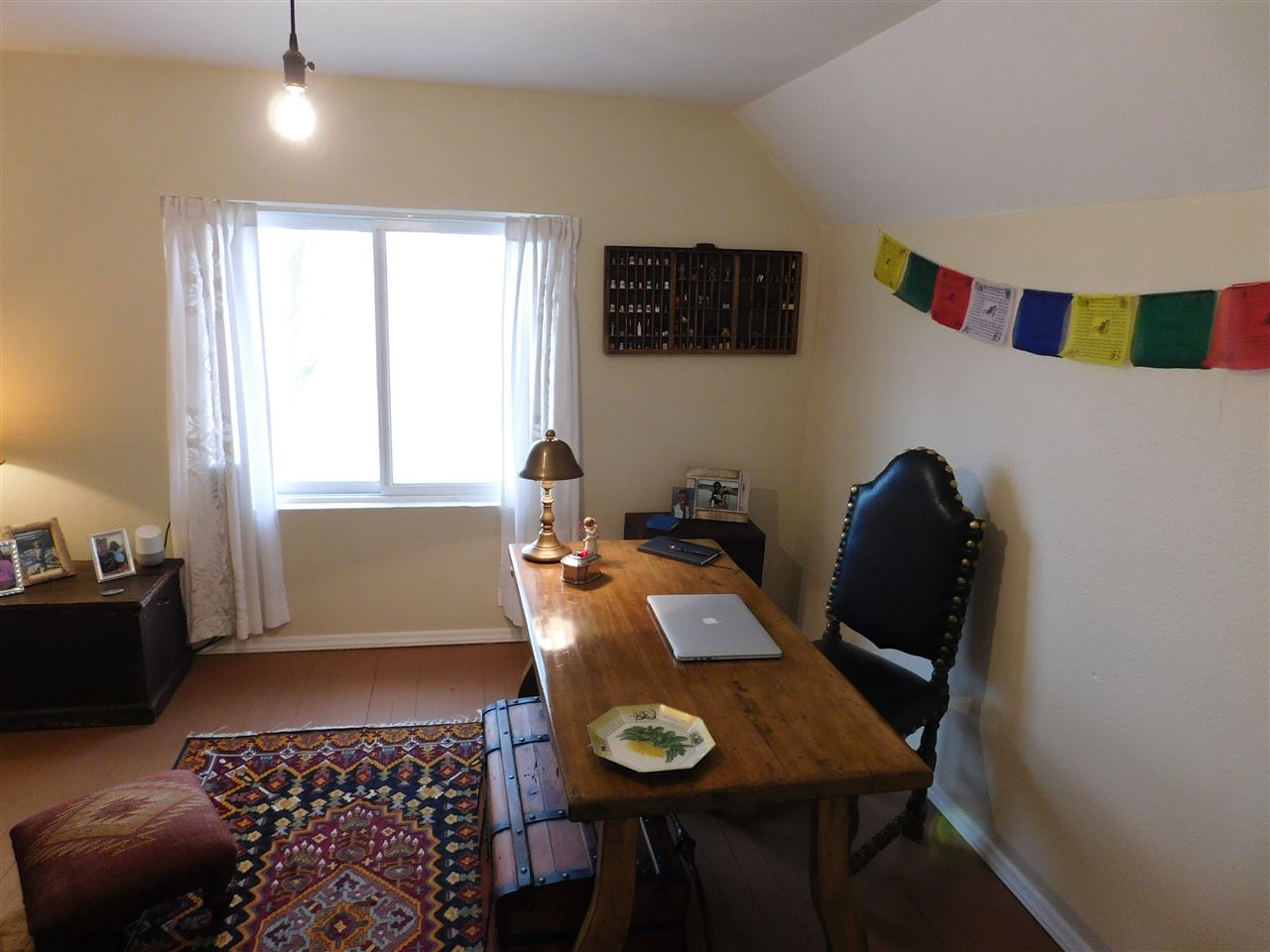 1640 P Road Loma, CO 81524 - Photo 16 of 40 a view of a workspace with furniture and a window