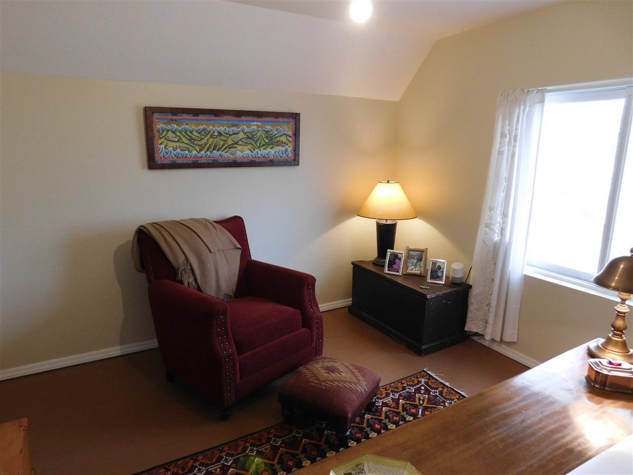 1640 P Road Loma, CO 81524 - Photo 17 of 40 a living room with furniture and a lamp