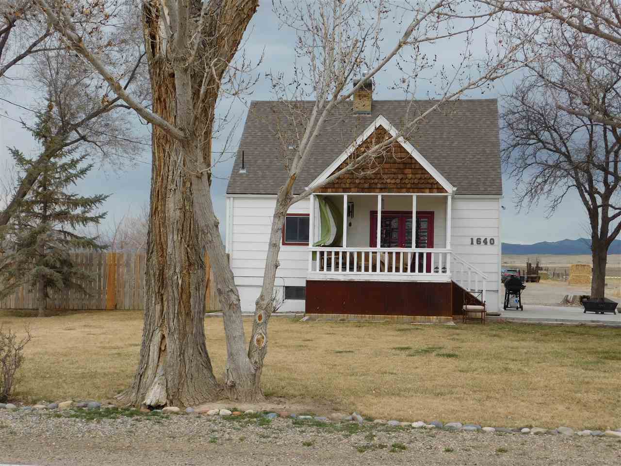 1640 P Road Loma, CO 81524 - Photo 2 of 40 a front view of a house with a yard